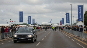 Farnborough taxi dropping visitors at the entrance of the Farnborough Airshow.